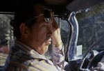 Warren Oates som Frank Mansfield