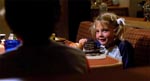 En ung Drew Barrymore i rollen som lillesøster Gertie