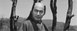 Tôshiro Mifune som Isaburo Sasahara Tôshiro Mifune som Isaburo Sasahara.