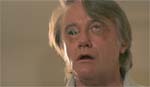 Dr. Fred Brown (Robert Vaughn).