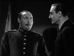 Inspektør Krogh (Lionel Atwill) og Baron Wolf von Frankenstein (Basil Rathbone).