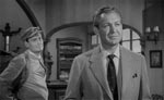 Alan Brooks (Forrest Tucker) er filmens slagkraftige protagonist - i baggrunden den skurkagtige Brett (Andrew Faulds) Alan Brooks (Forrest Tucker) er filmens slagkraftige protagonist - i baggrunden den skurkagtige Brett (Andrew Faulds)