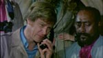 Dr. Peter Chandler (Ian McCulloch) & Molotto (Dakkar).