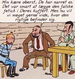 Tintin i kløerne på albummets to hovedskurke Tintin i kløerne på albummets to hovedskurke.